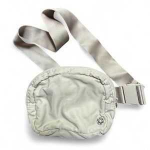 GAIAM belt bag/crossbody bag. Light gray, clean, no flaws.